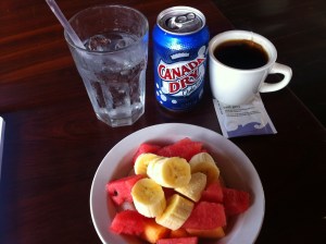 Bowl of fruit - $2 USD, soda water- $1 USD, hot tea/coffee- $1 USD